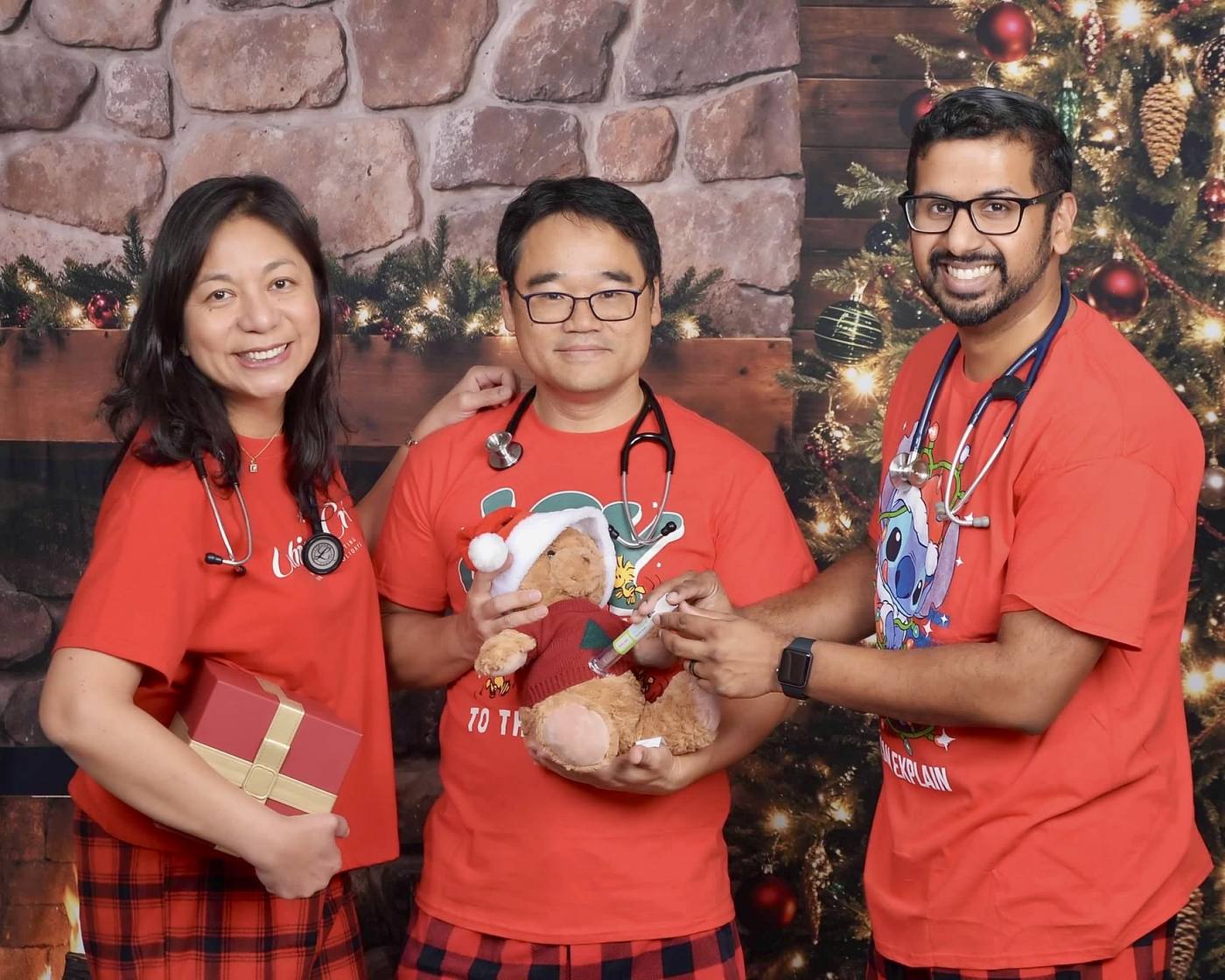 Dr. Basa, Dr. Kim and Dr. Varughese at the holiday celebration